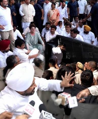 BREAKING: Rahul and Priyanka sit on the road outside the PM's residence; Congress MPs being detained.