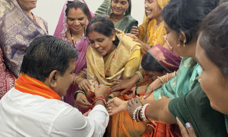 Women from the 'Bihan' group tied a Rakhi to Vijay Sharma on Raksha Bandhan; discussions were held regarding lessons learned from Gujarat.
