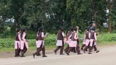 Stir caused by 45 female students marching on foot; officials sent a bus, and they reached the Collectorate.